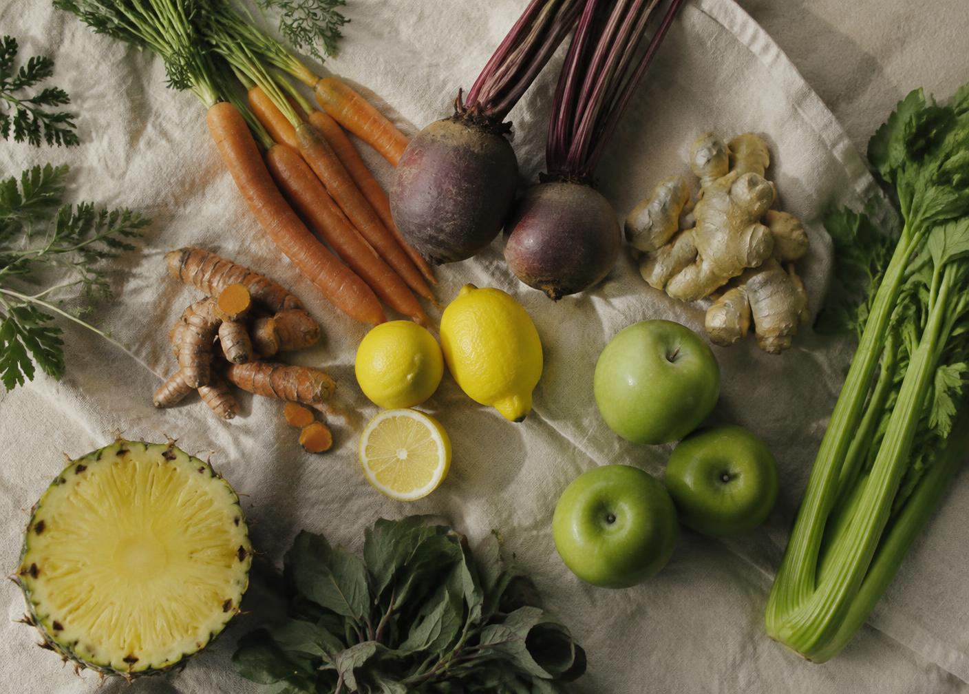 Fresh carrots, beets, turmeric, citrus and celery